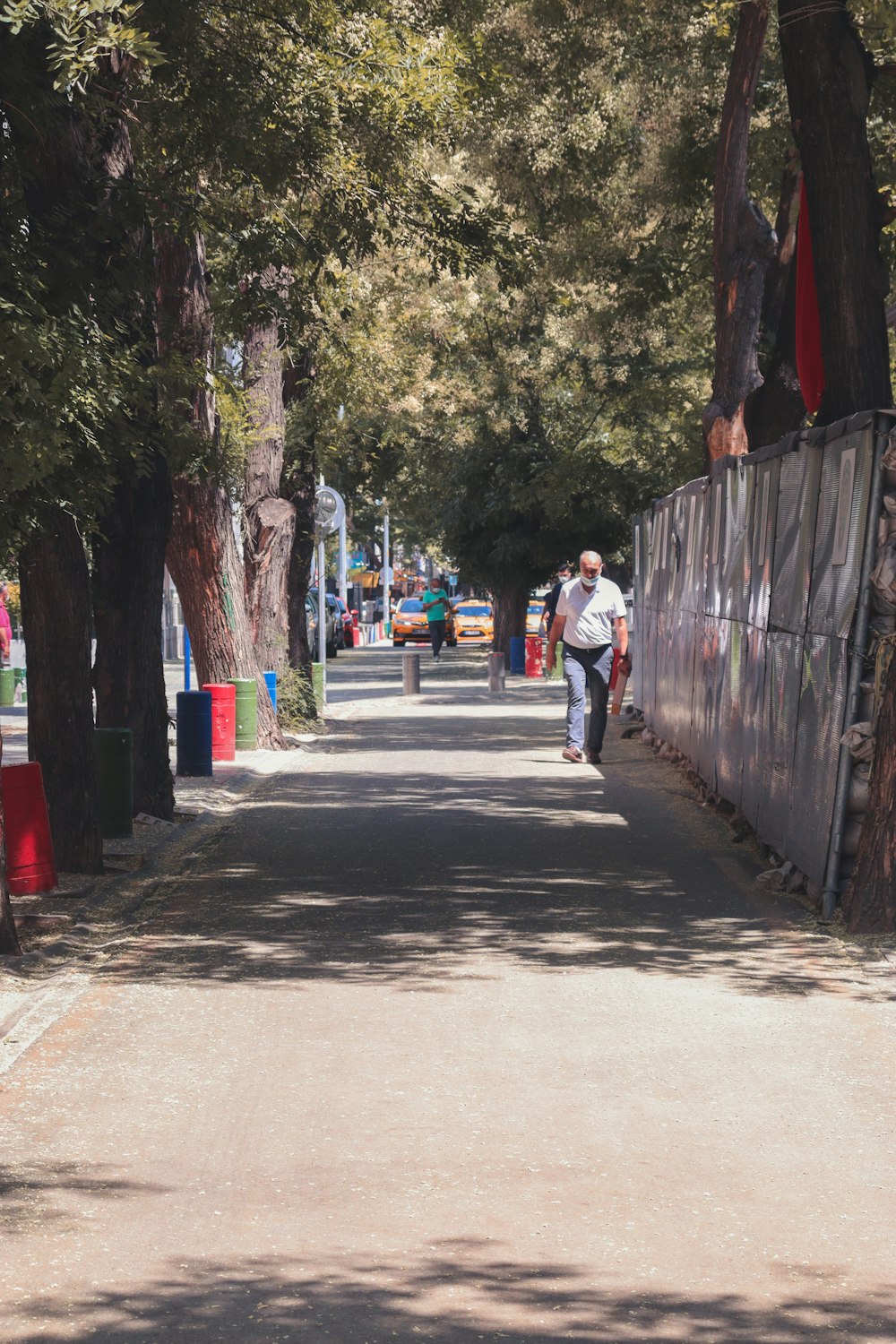 people walking on sidewalk during daytime