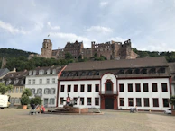 Historic castle ruins perched on a hilltop overlooking the Palencia countryside.