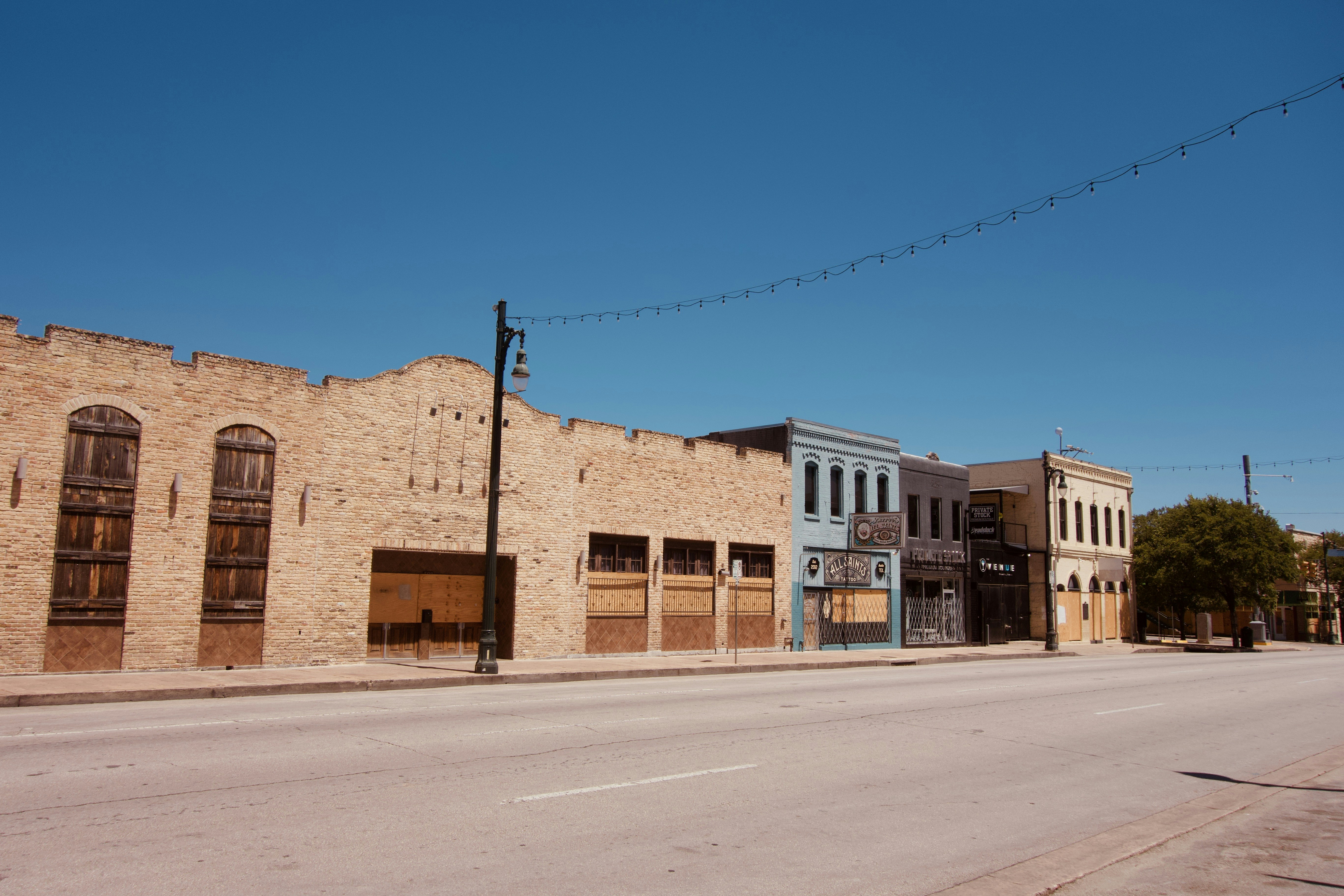 brown concrete building under blue sky during daytime