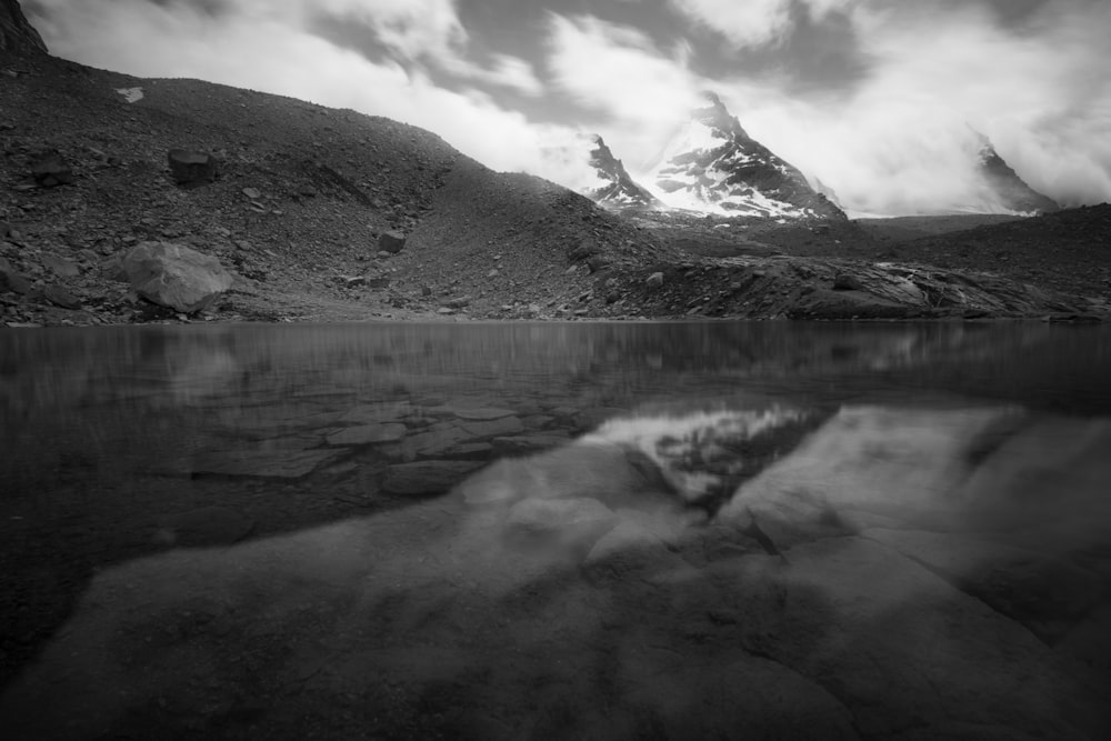 grayscale photo of mountain range