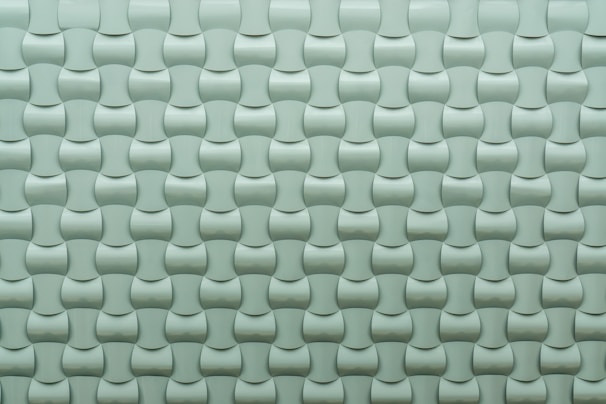 High-definition 3D patterned ceramic wall tiles transforming a modern kitchen backsplash.