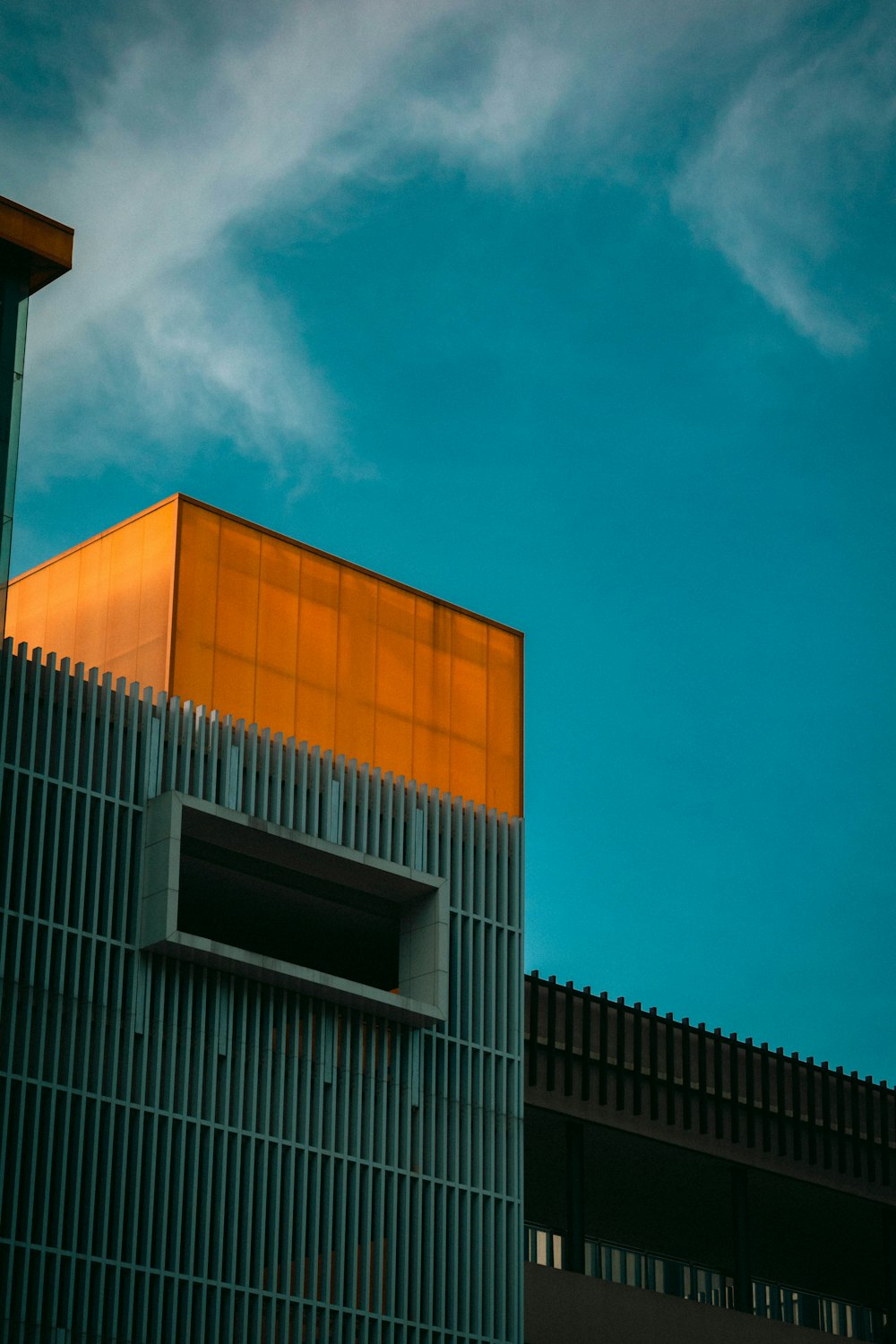 brown concrete building under blue sky during daytime