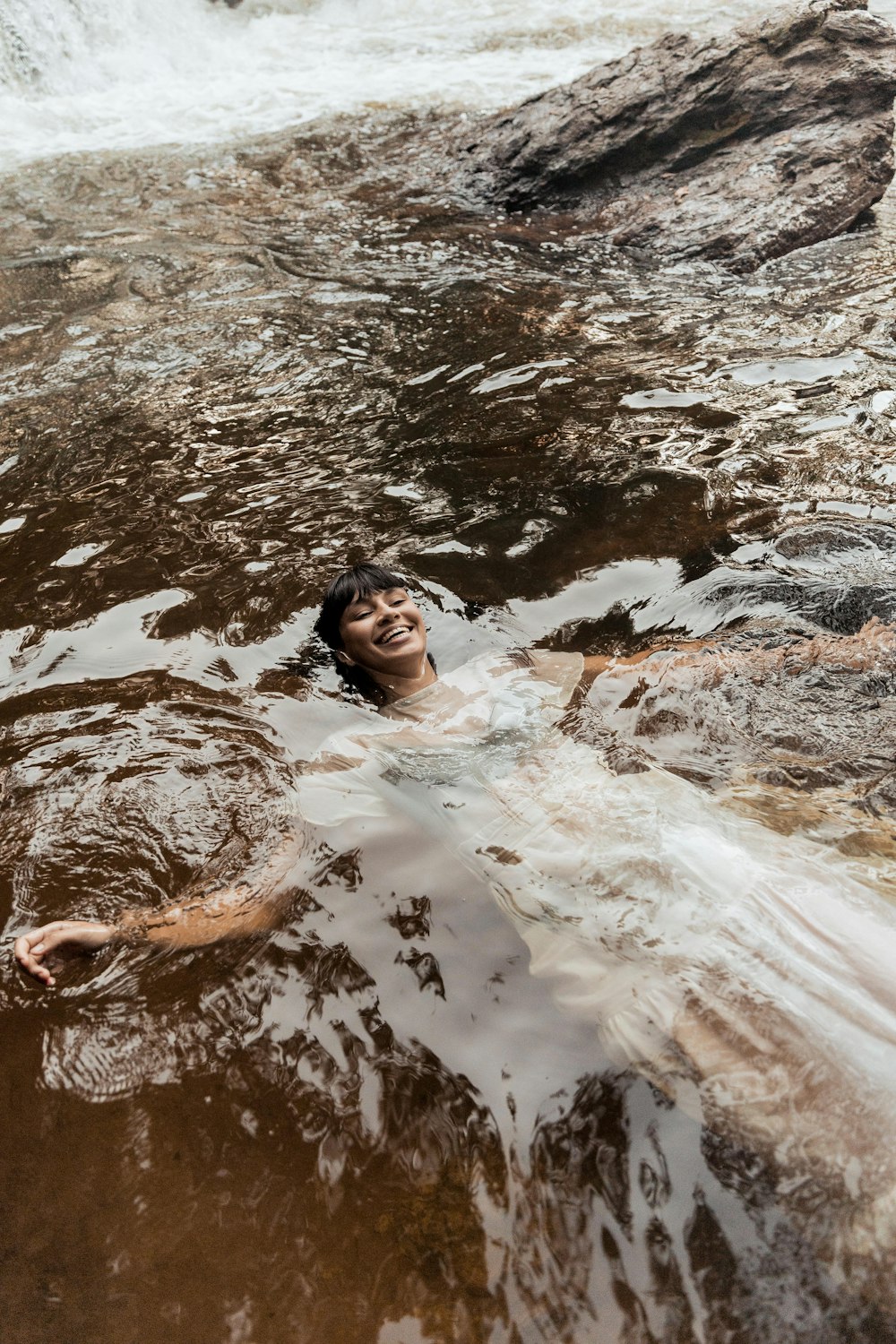 woman in water during daytime