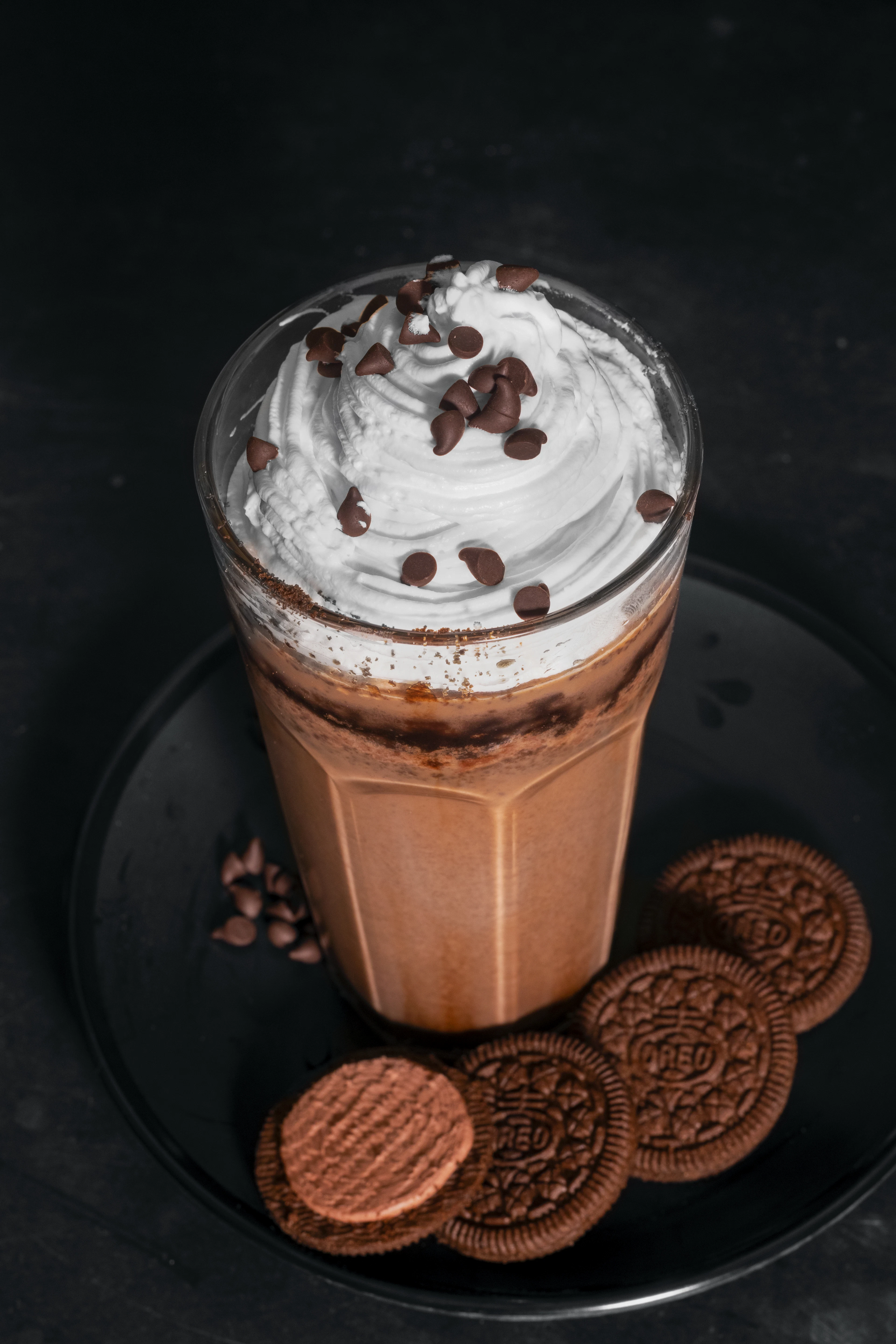 A creamy iced drink with a whipped top