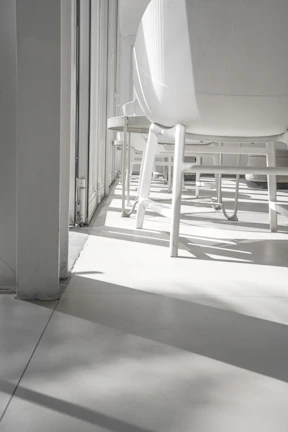 Bright, minimalistic therapy room with soft natural light and comfortable seating.