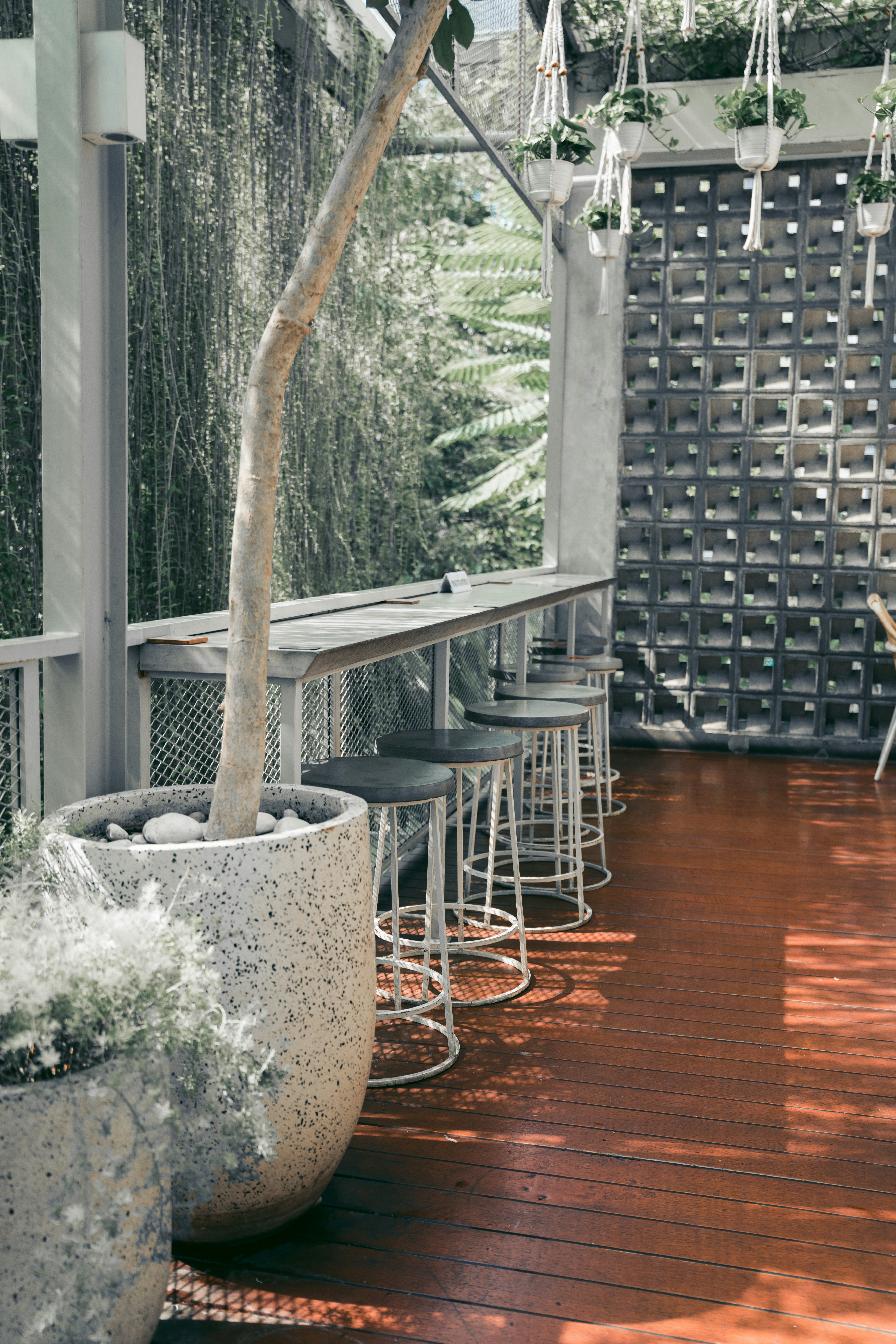white and brown round table with chairs