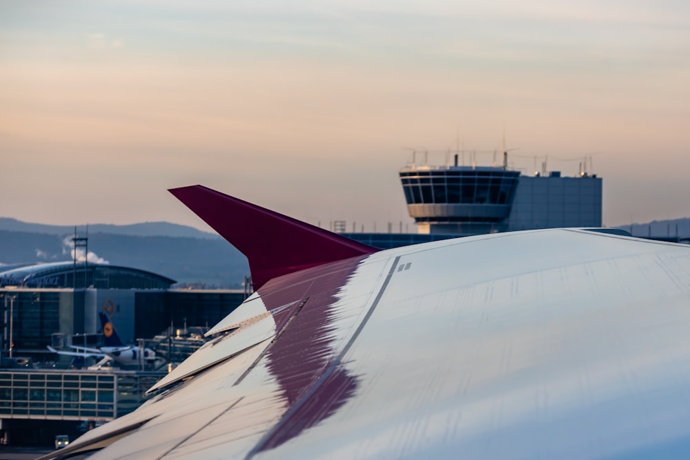 white and red airplane wing