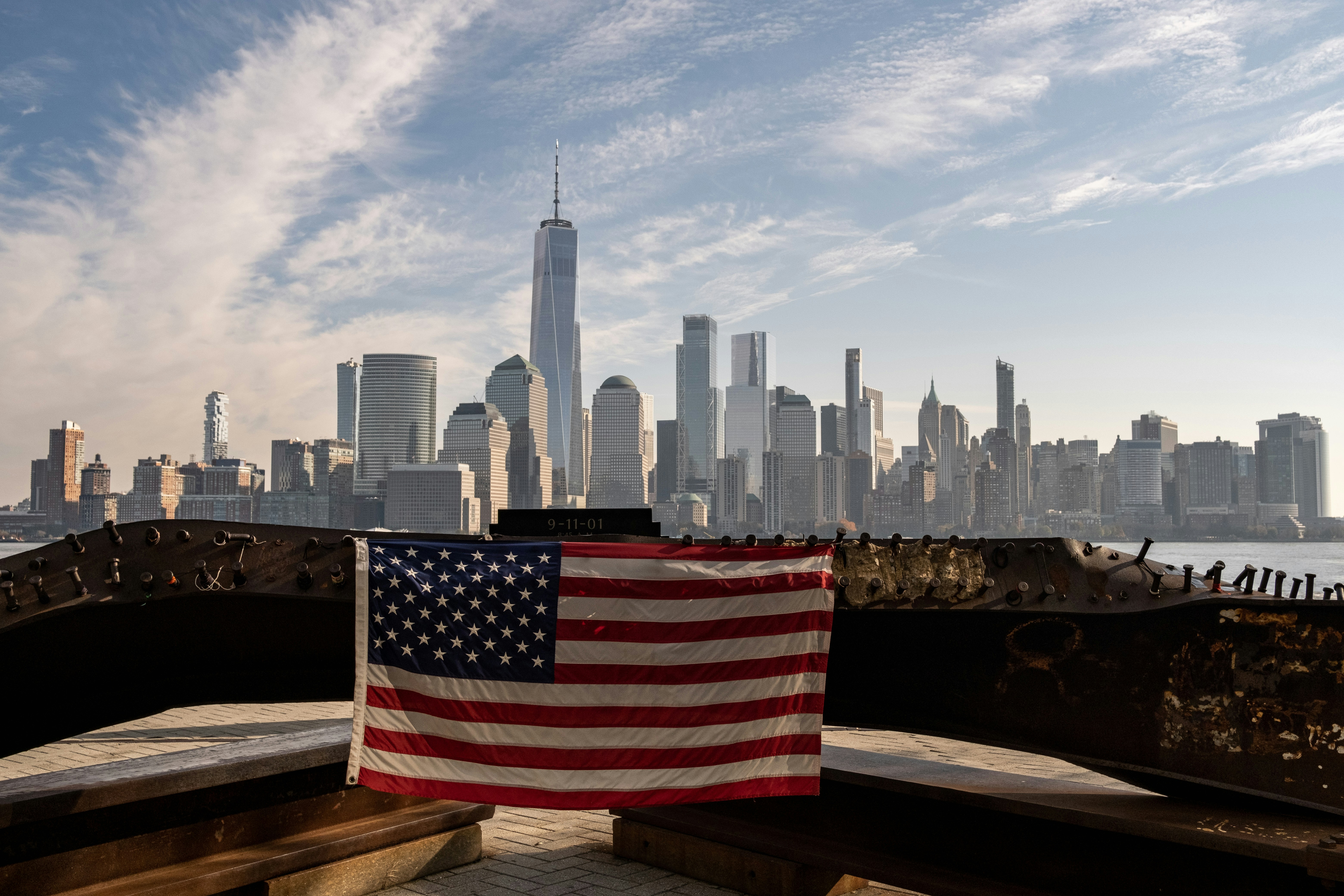 us a flag on brown wooden bench