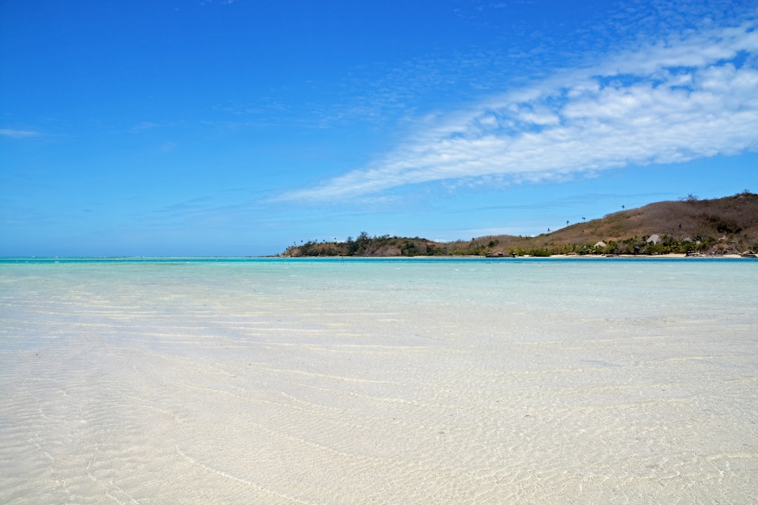 blue sea under blue sky during daytime