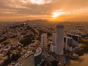 aerial view of city buildings during sunset