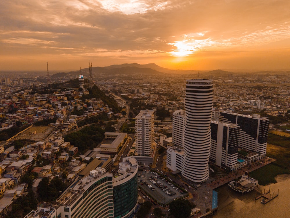 aerial view of city buildings during sunset