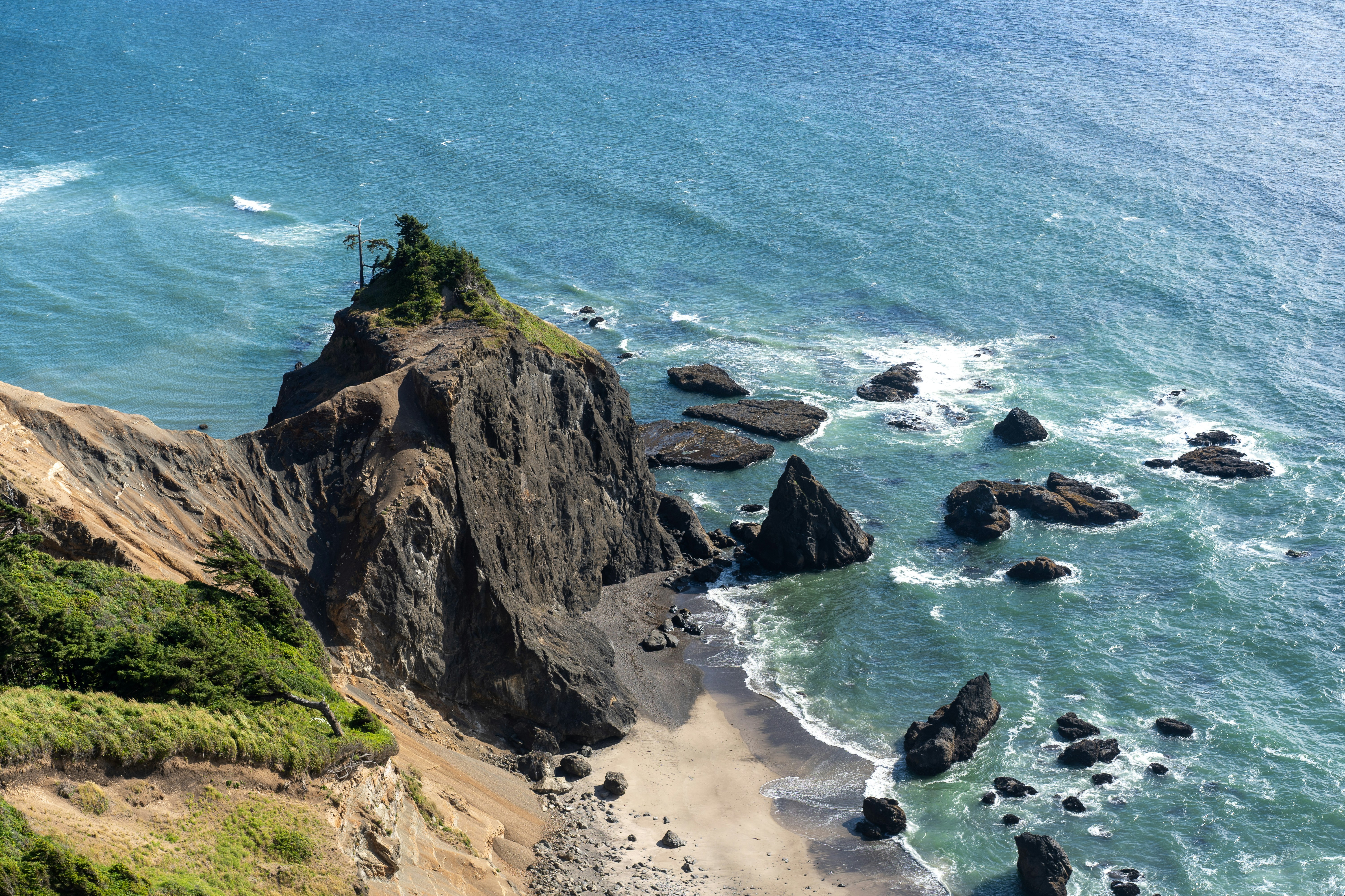 brown rock formation on sea shore during daytime, Scenic viewpoint of Oregon coast