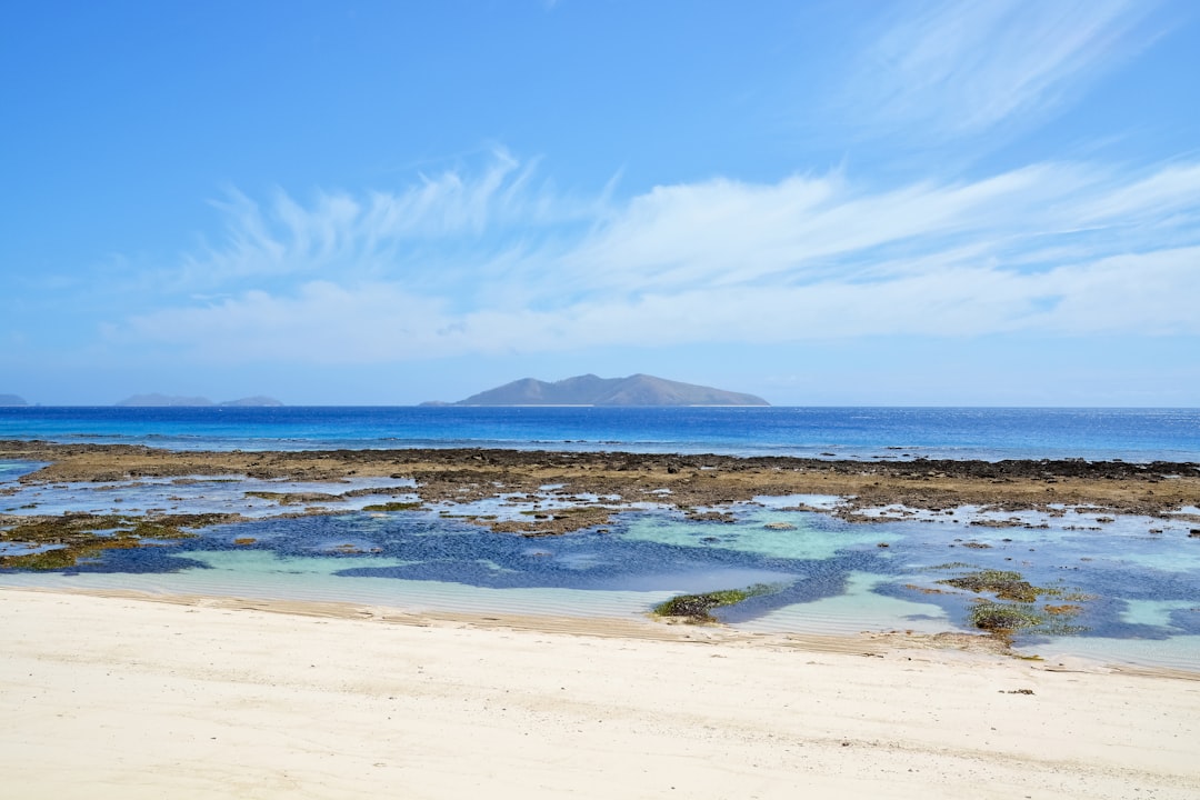 blue sea under blue sky during daytime