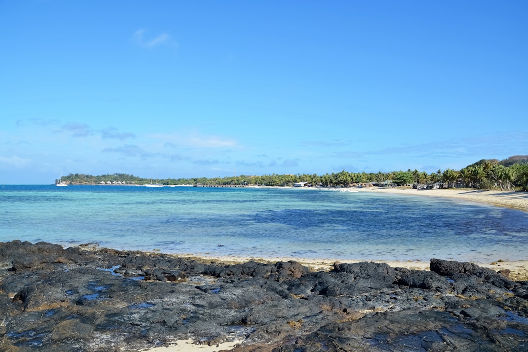 blue sea under blue sky during daytime