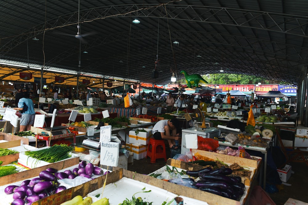 people in market during daytime