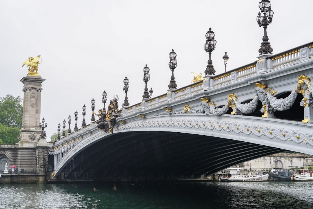 white concrete bridge over water