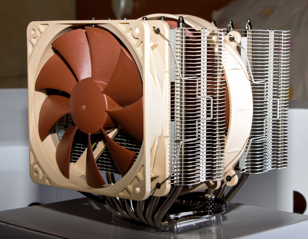brown and white box fan
