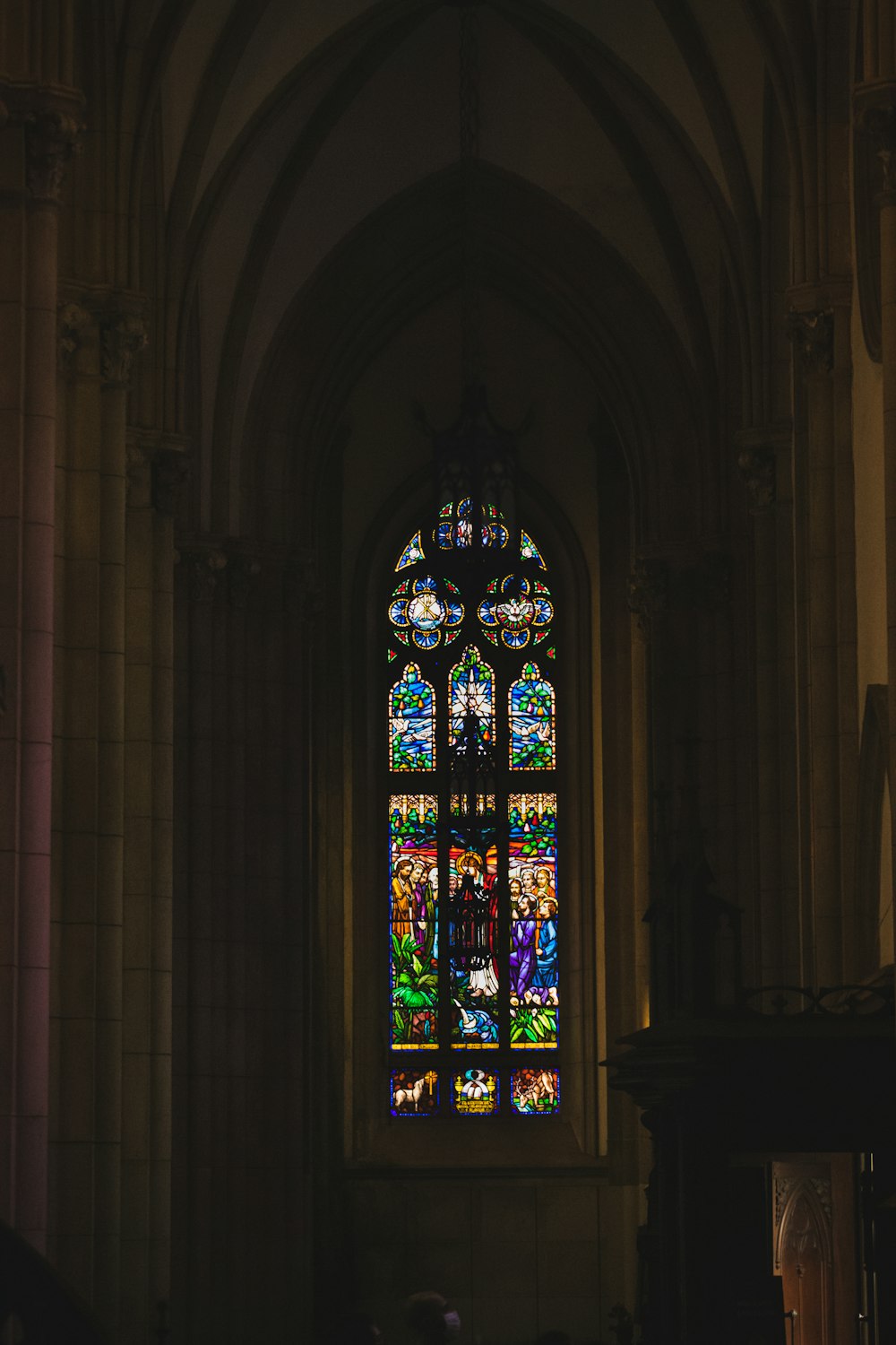 blue red and yellow glass window