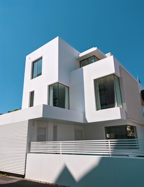 white concrete building under blue sky during daytime