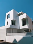 white concrete building under blue sky during daytime