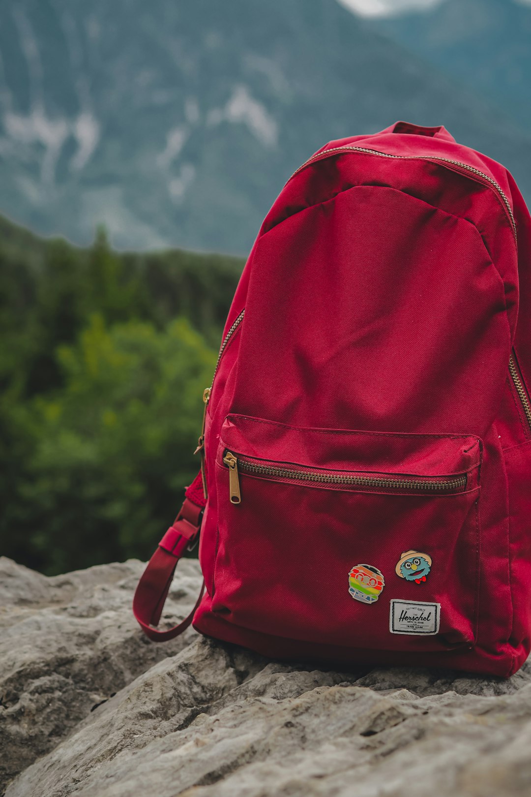 red backpack on brown sand