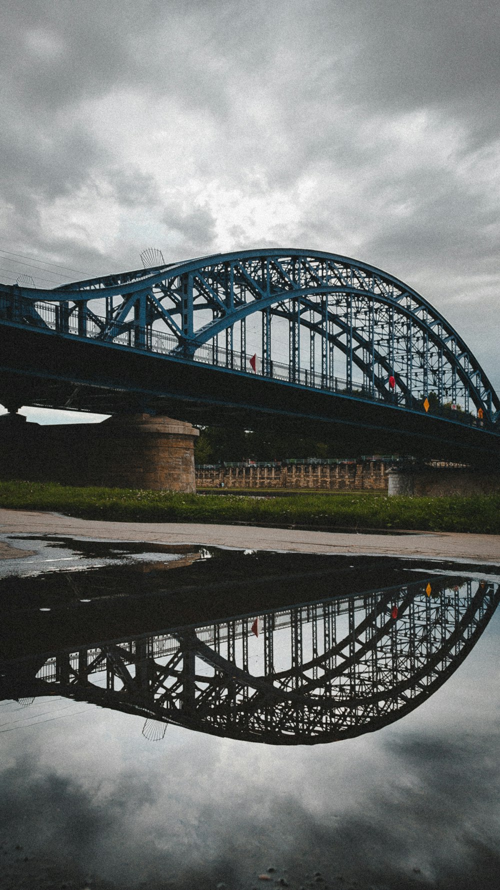 gray metal bridge over river