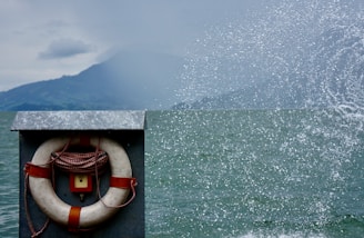 white and red boat on sea during daytime