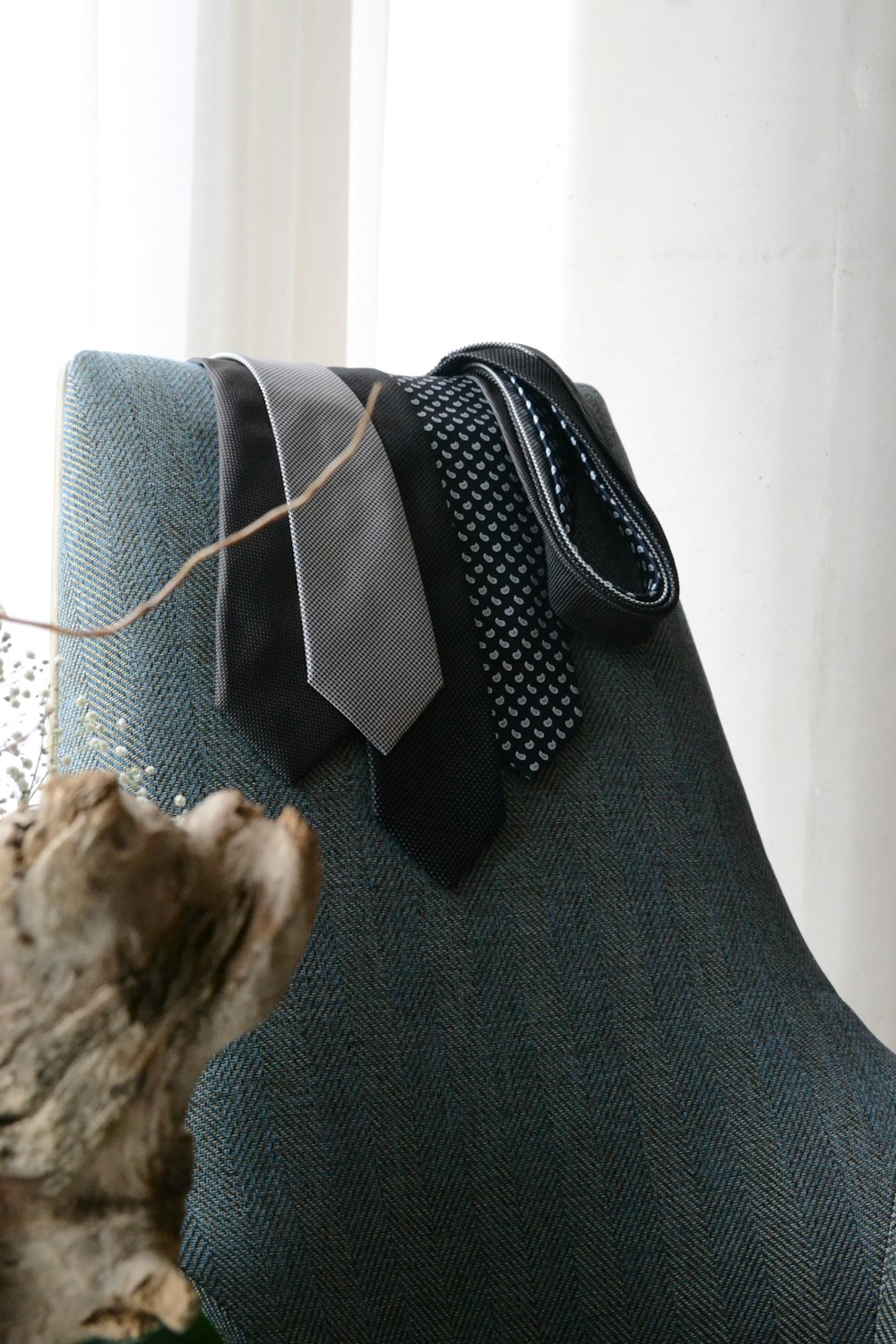 black and white polka dot bag on gray textile