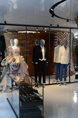 people in white dress standing on white floor tiles