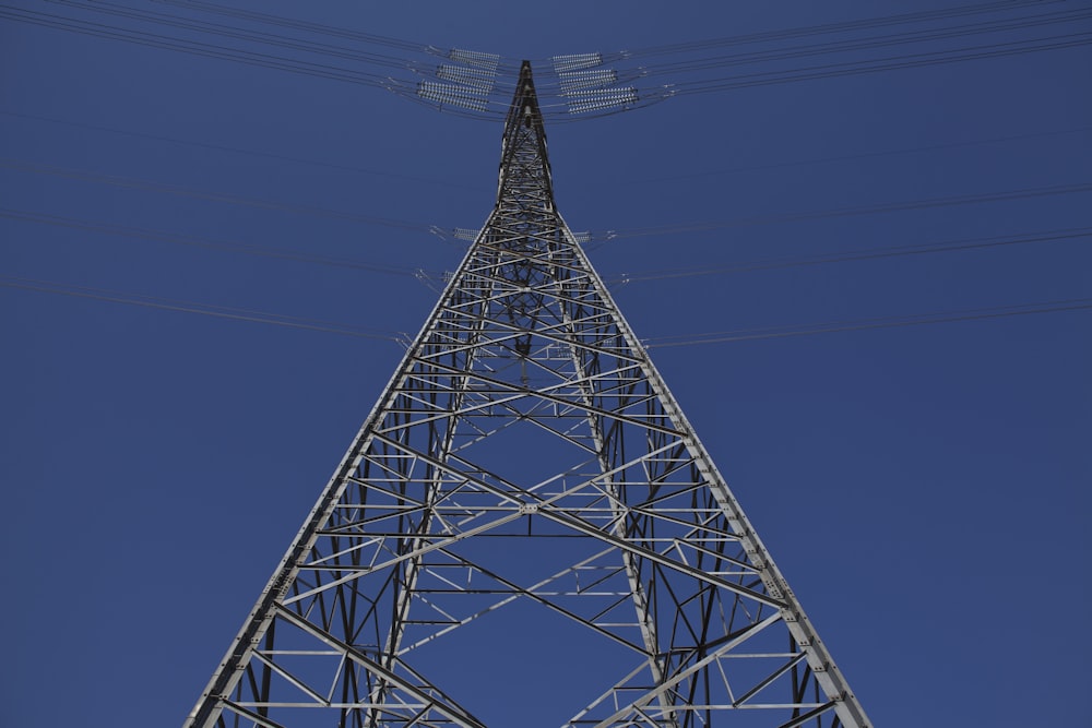 gray metal tower under blue sky during daytime