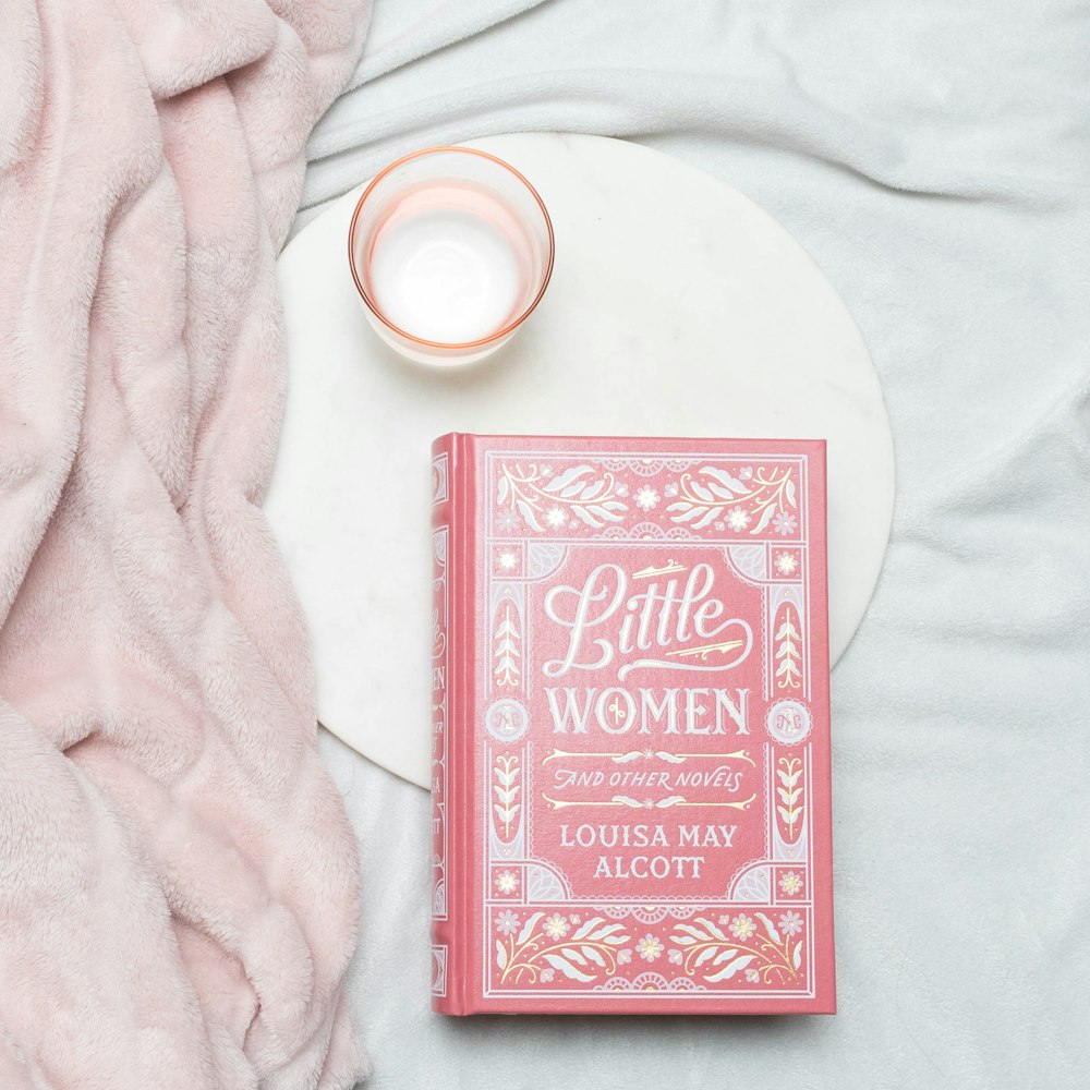 A couple of boxes sitting on top of an open book photo – Free Flatlay Image  on Unsplash