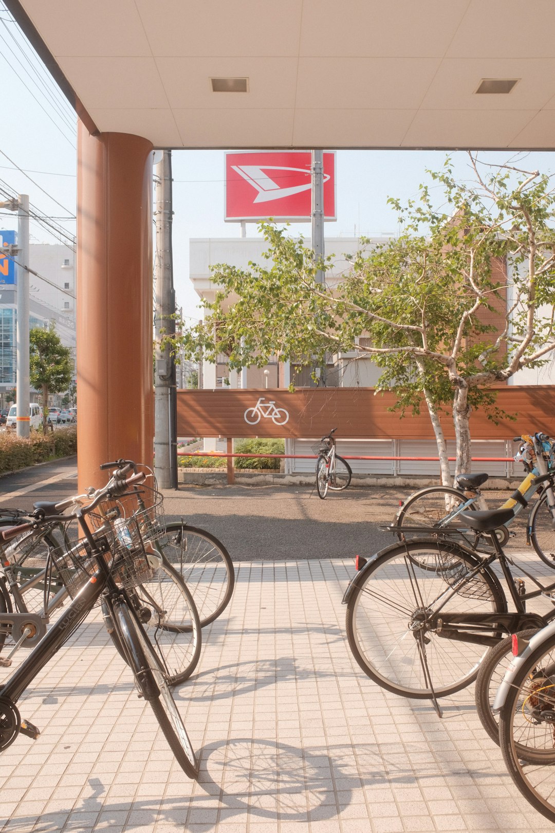 bicycles parked on sidewalk during daytime