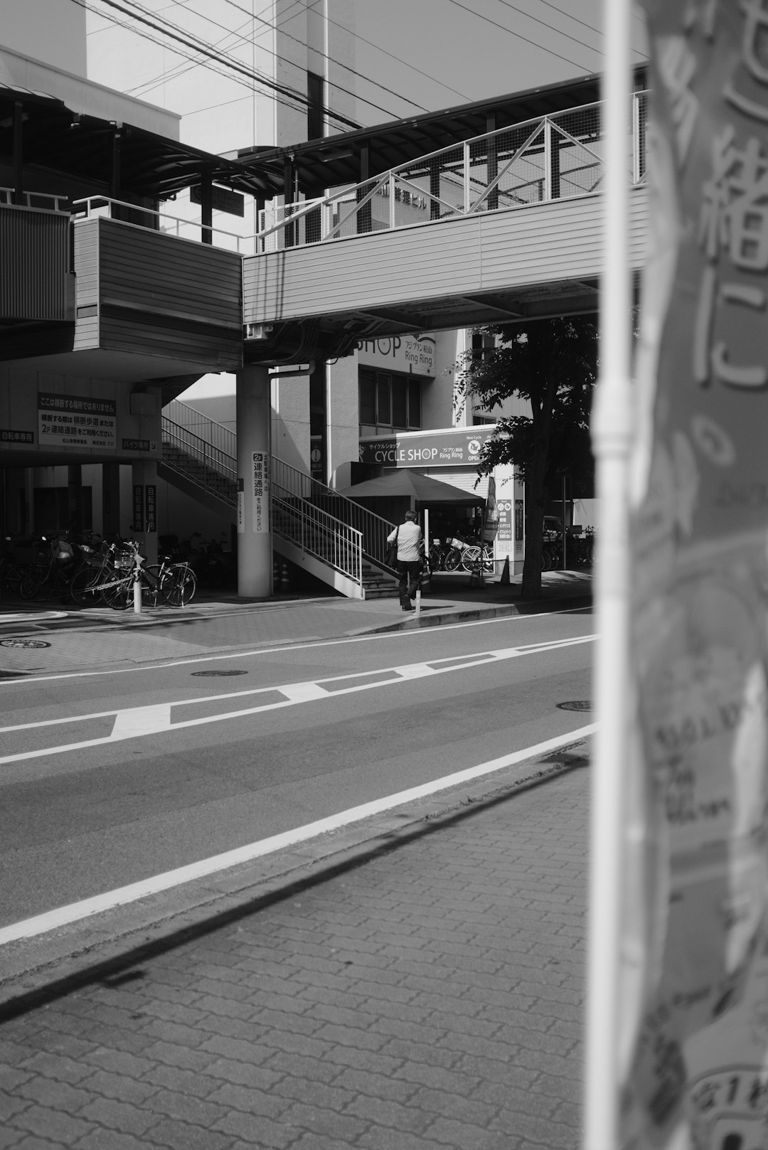 grayscale photo of cars on road