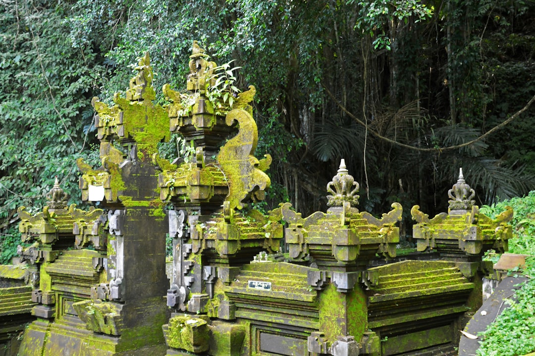 gold and green concrete statue