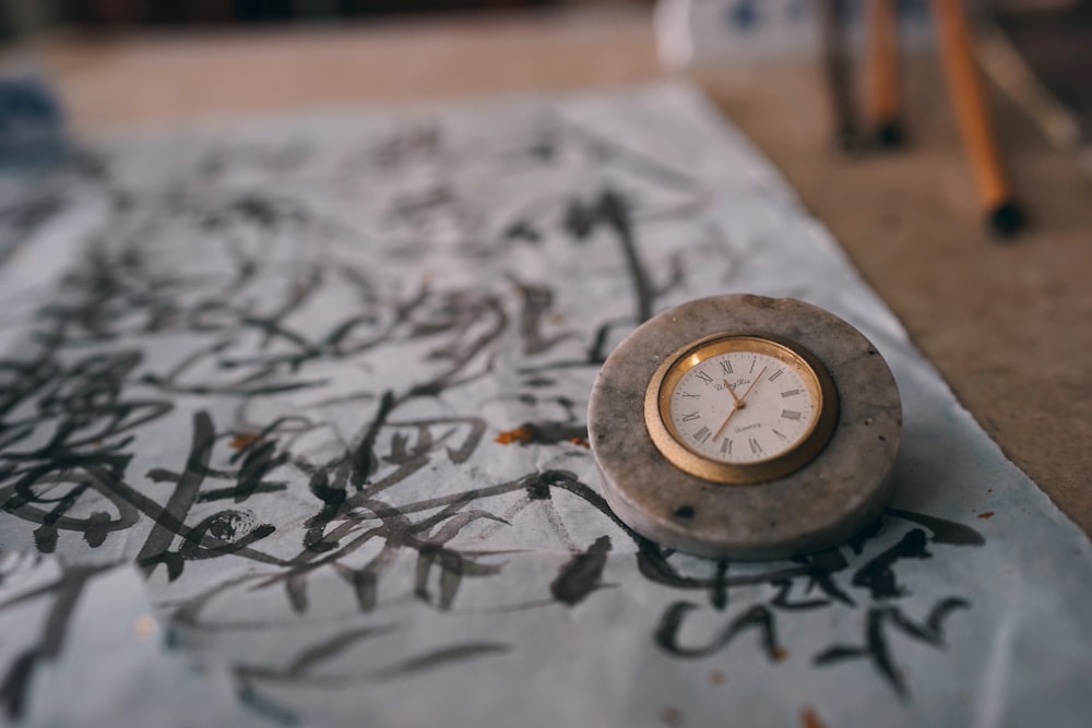 black and white analog clock