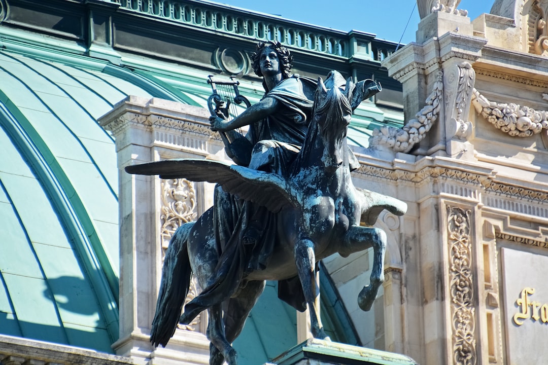 black statue of man riding horse