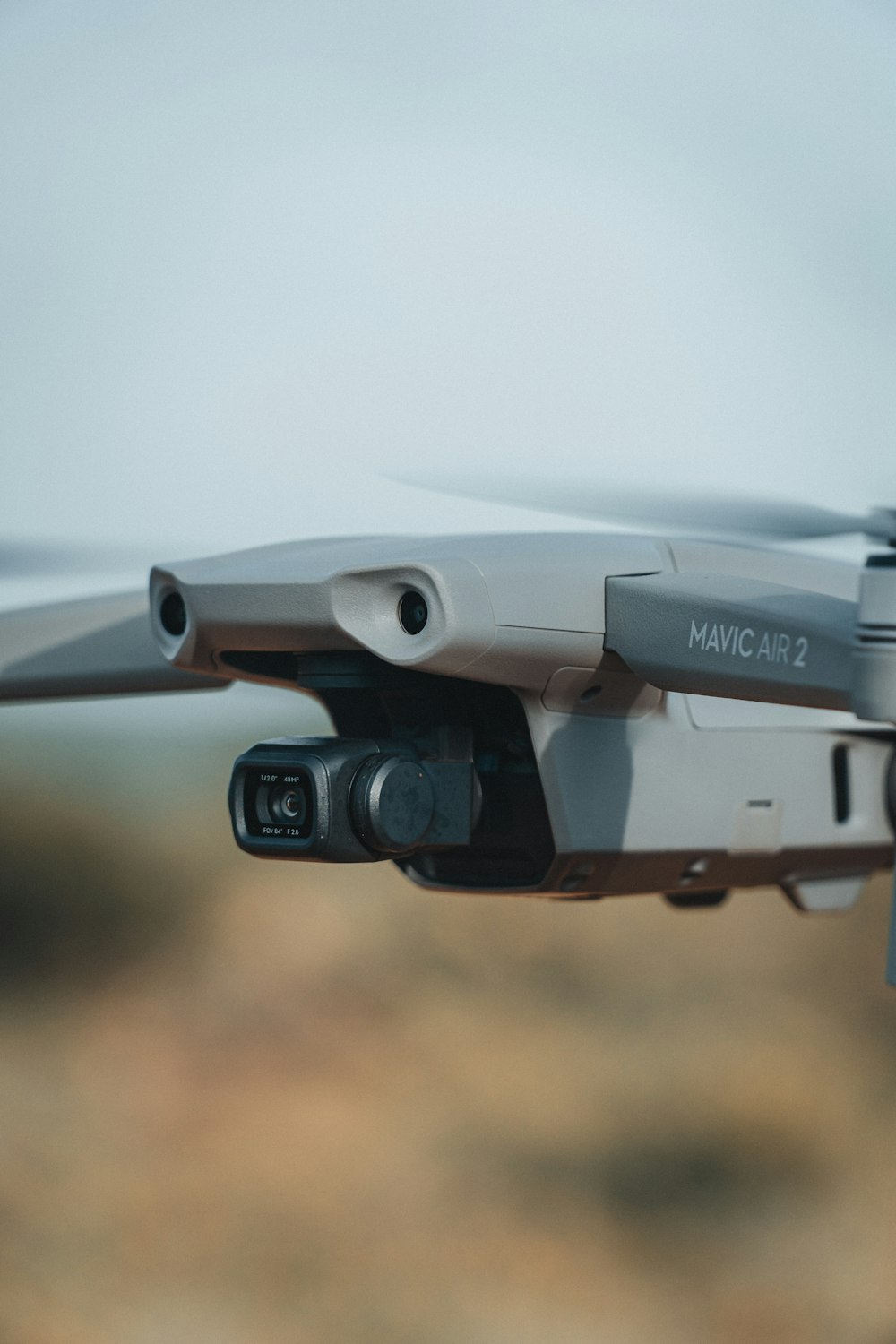 white and black drone in close up photography