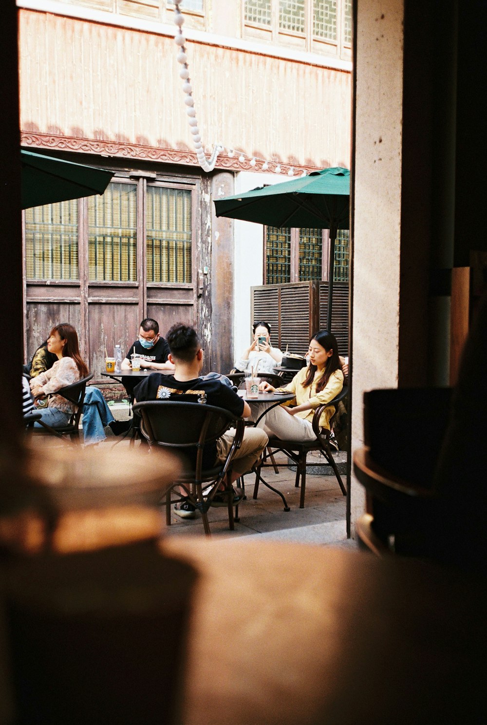 people sitting on chairs during daytime