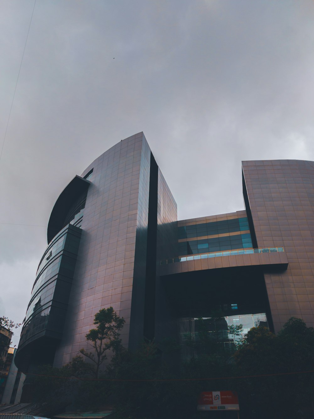 brown concrete building under white sky during daytime