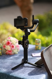 black dslr camera on black table