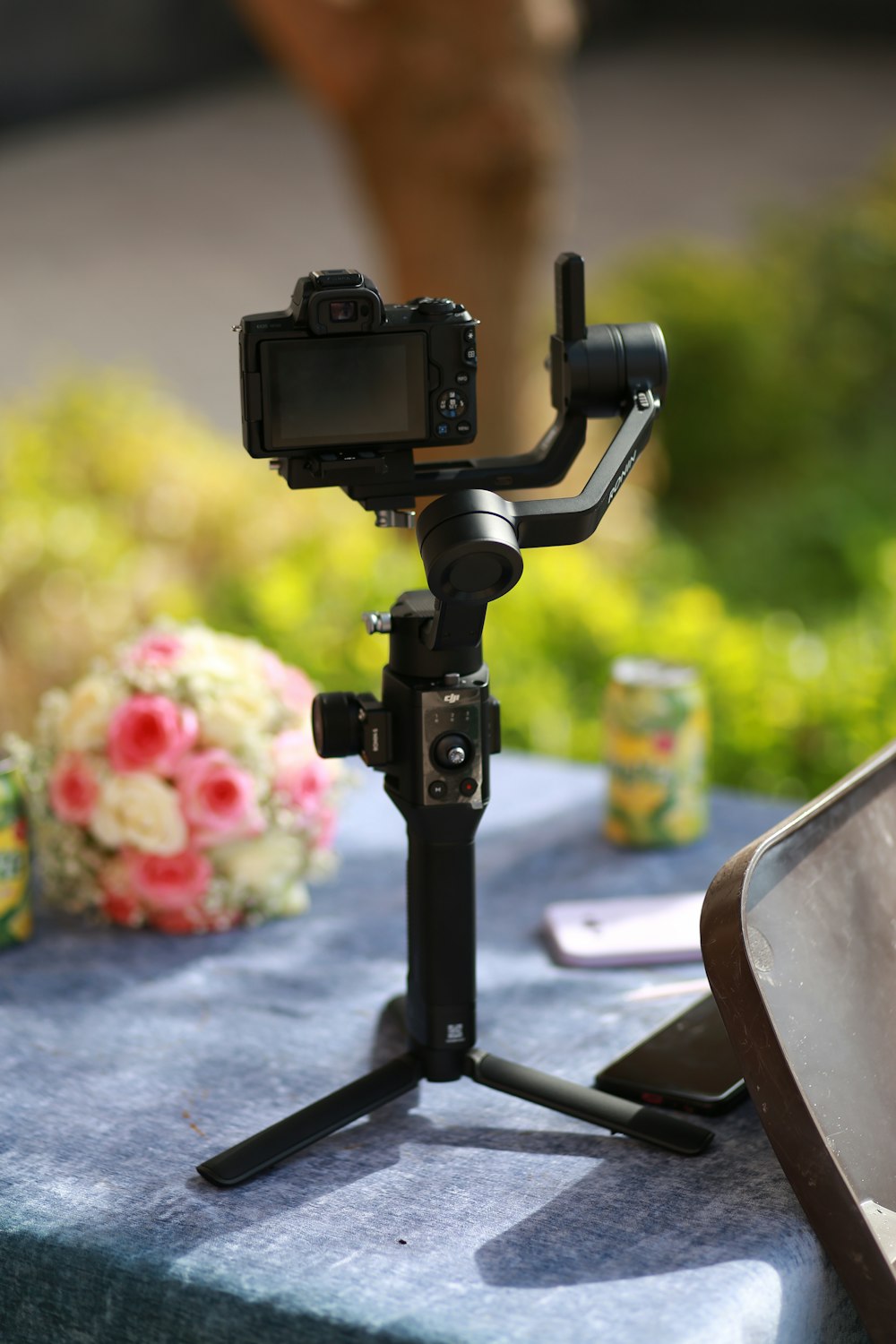 black dslr camera on black table