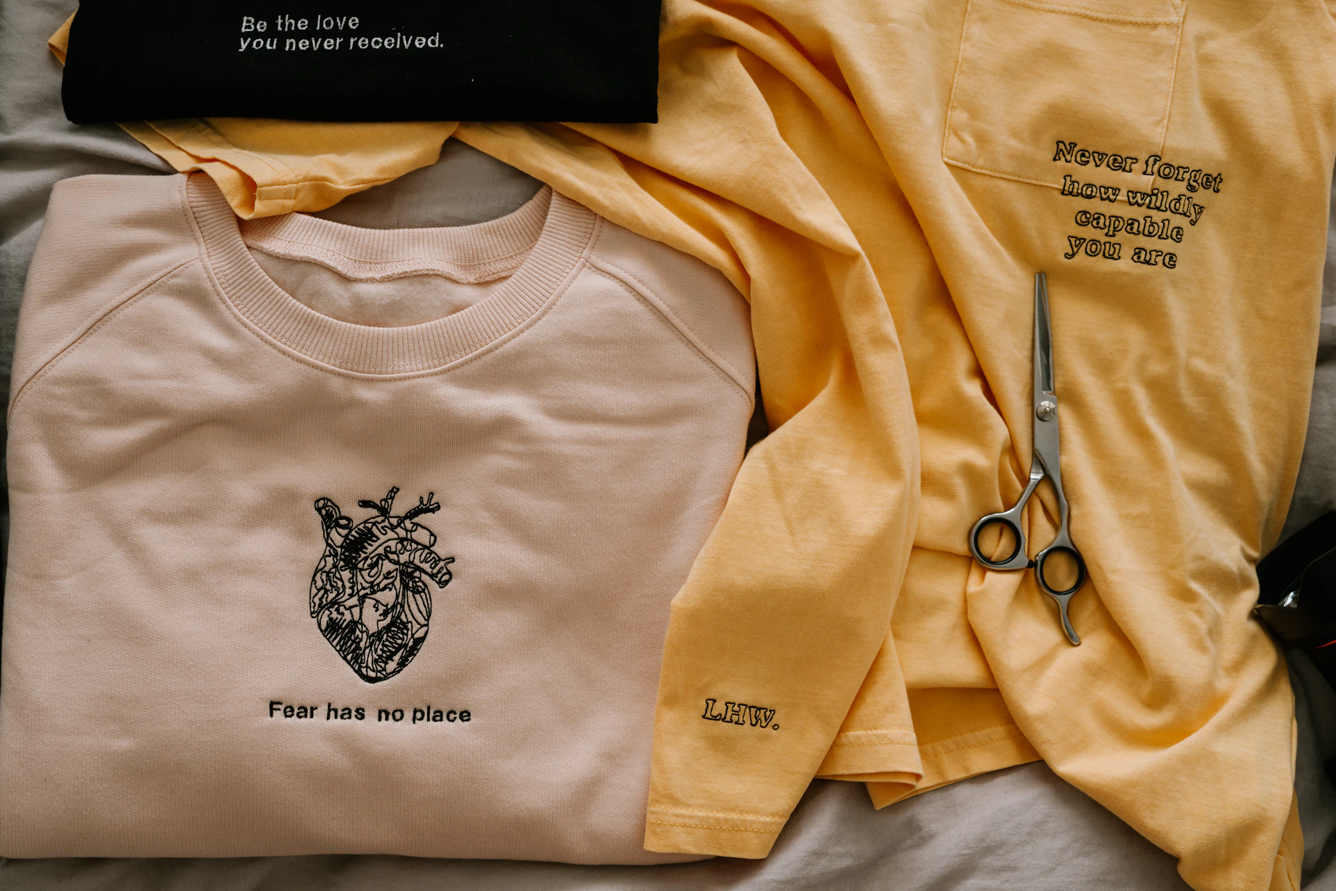 yellow and black crew neck shirt