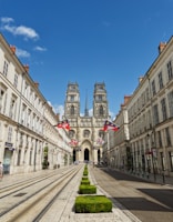 people walking on sidewalk near building during daytime