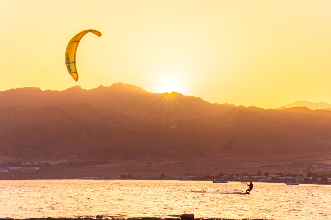 person surfing on sea during daytime