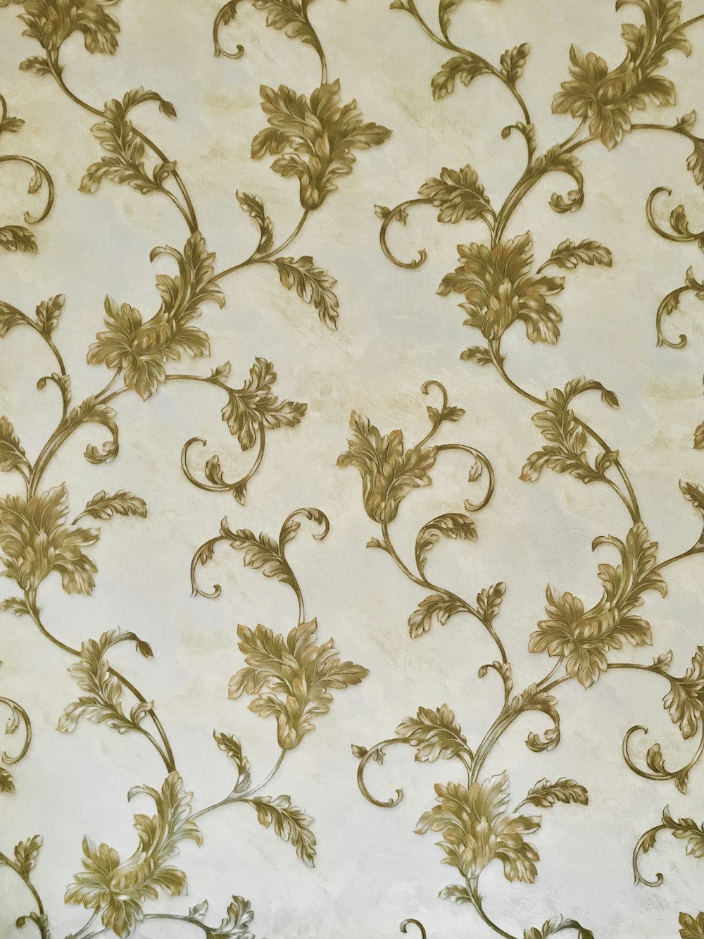 white and brown floral textile