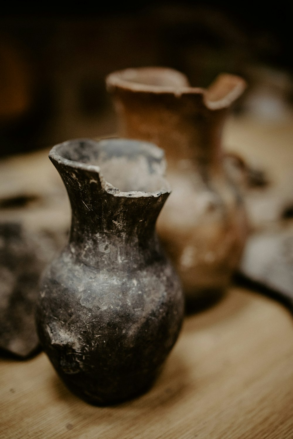 brown and black ceramic vase