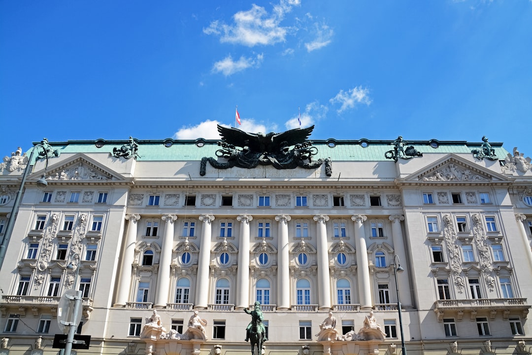 white concrete building under blue sky during daytime