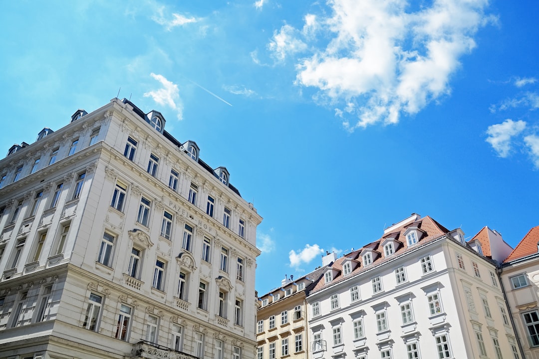 white concrete building under blue sky during daytime