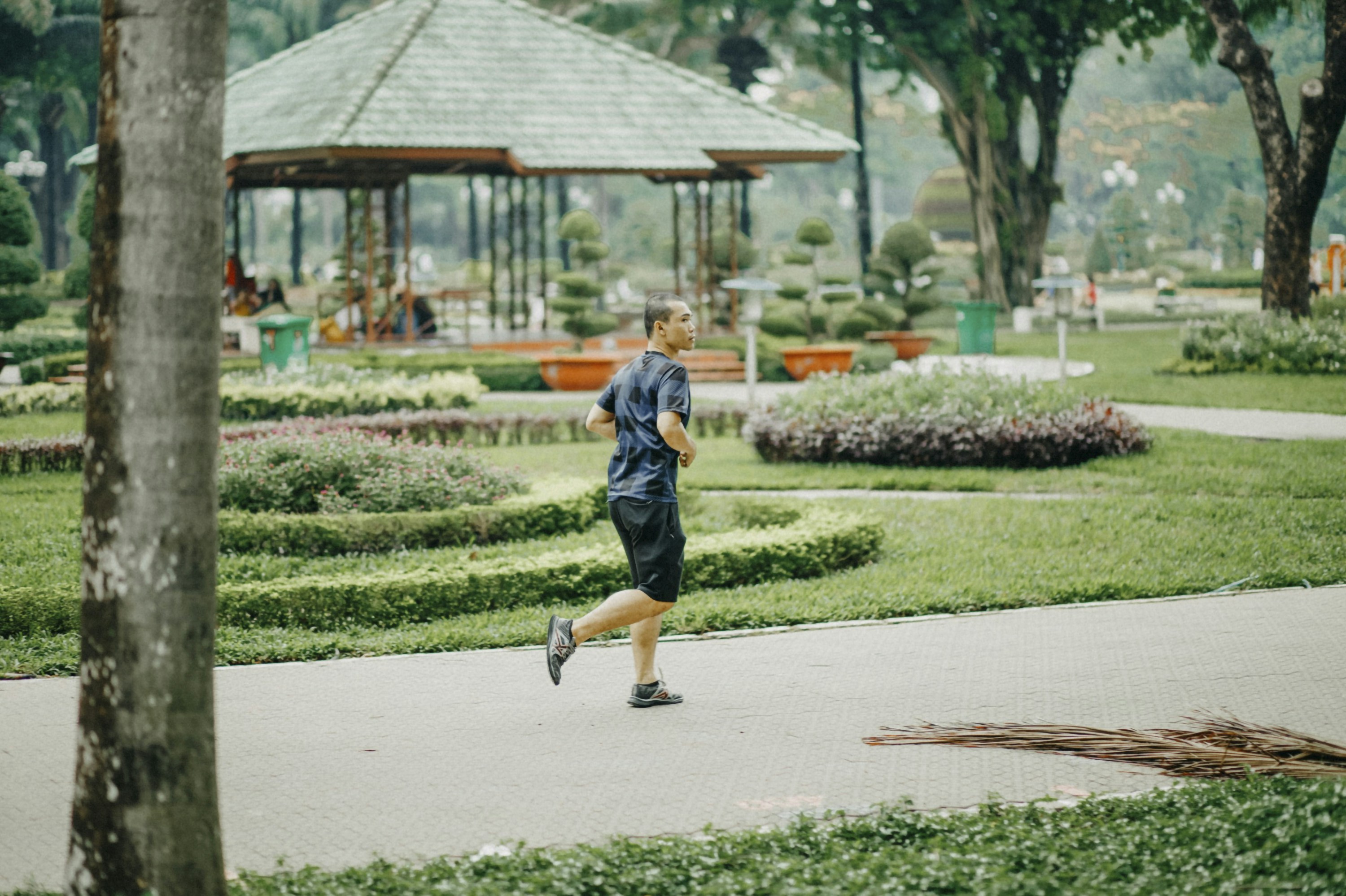 person jogging in park - cost for life insurance