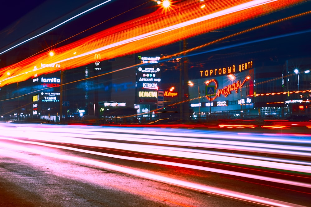 time lapse photography of cars on road during night time